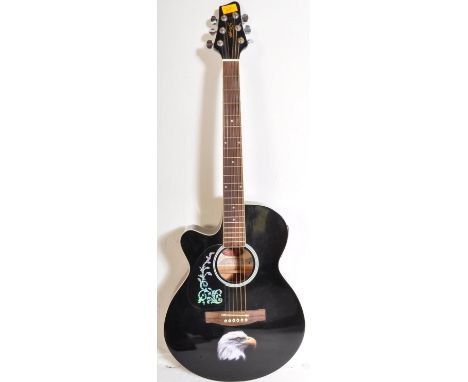 Stagg Guitars - Serial No. 0911/69 - A Stagg left handed electric / acoustic guitar with a hollow body with decorated pick gu