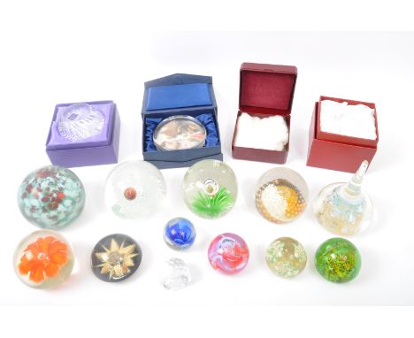 A collection of vintage 20th Century glass paperweights. Comprising of; teardrop, spherical floral, Arthur Price, Italian Mur