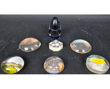 A collection of retro vintage 20th Century glass paperweights. Including scenic and tourist place paperweights, a lava lamp s
