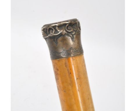 An early 20th century gentleman's walking stick having silver plated handle atop with hinged lid with engraved initials G. L.