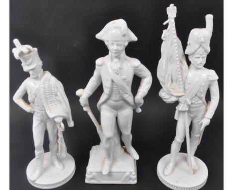 A collection of three blanc de chine Dresden porcelain figures depicting Napoleonic Soldiers. Measures 25cm tall. Stamped to 