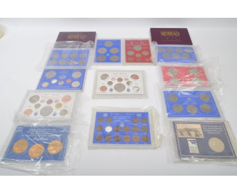 A large collection of vintage 20h century commemorative coins sets. The lot to include two 1970 coinage of Great Britain and 