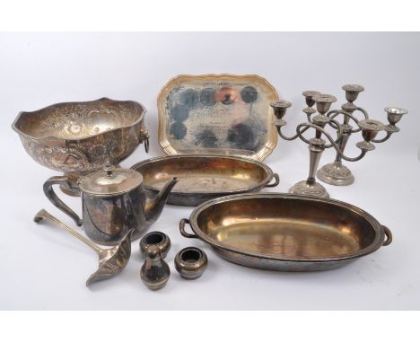 An assortment of early 20th century silver plated items to include tray, wine coaster, an Embassy teapot, ladle, Embassy crue