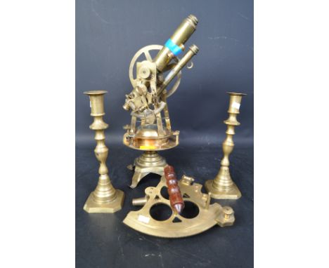 A collection of vintage 20th Century brass items. To include; a pair of candle stick holders on square bases, a Nauticalia re