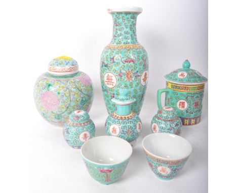 An assortment of vintage 20th century ceramic Chinese Oriental Famille Rose items. The lot to include a flared tall neck vase