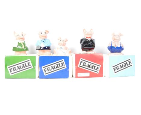 A set of five original Wade made Natwest pigs. Four of the ceramic money boxes within the original packaging.&nbsp;