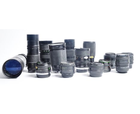 A mixed collection of 14 x camera lenses. Models are: Soligor 400mm f 6.3, Super Danubia 37-105mm f3.5, Sigma 35-70mm f3.5-4.