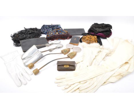 An assortment of 19th century and later ladies accessories to include a black velvet mourning bonnet, a 1920's sequinned fasc