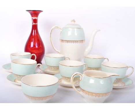 A vintage 20th century Johnsons &amp; Bros china coffee service in light blue &amp; white colourways with abstract gilt patte