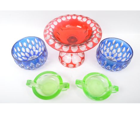 A collection of vintage 20th Century studio art glass. Including a cranberry red tazza centerpiece bowl, a pair of blue decor