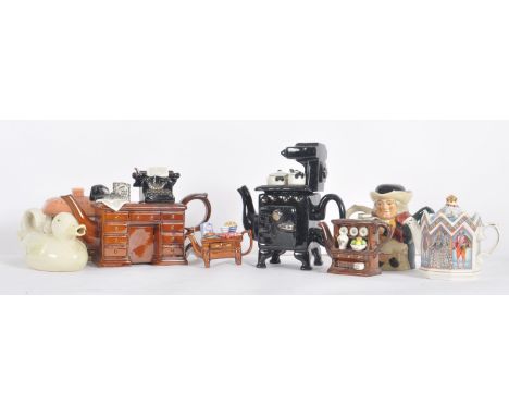 A collection of 20th Century Paul Cardew &amp; other novelty ceramic teapots. Each of unusual form with some having small app
