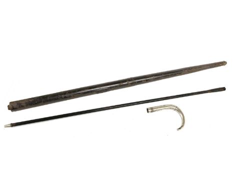 A 19th Century Air Cane, of black painted steel, the 46cm sighted barrel with a brass ferrule screwing out to form the wood r