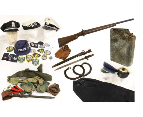 A Quantity of Militaria, including a US 1917 bayonet by Remington, with steel mounted scabbard, a bayonet practise musket, a 