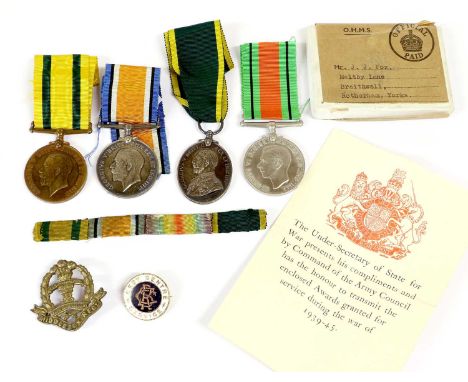 A First/Second World War Group of Four Medals, awarded to 1390 CPL.J.J.FOX, MIDD'X R., comprising British War Medal, Territor