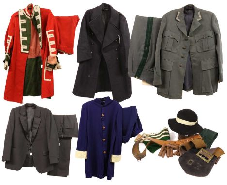 A Quantity of Uniforms, including a post-Second World War Civil Defence black wool greatcoat, a Norwegian Army officer's unif