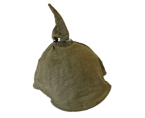 A First World War German M1892 Officer's Überzug (Helmet Cover), of plain light brown cloth, with fold-over peak boards .Two 