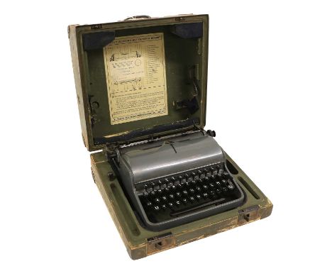 A Second World War German Olympia Robust Portable Typewriter, with dark grey enamelled case, lacking the paper guide plate, t