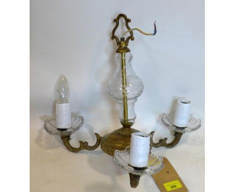 A gilt metal and glass chandelier 