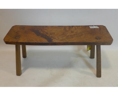 A 19th century mahogany stool, raised on splayed legs, H.31 W.63 D.20cm 