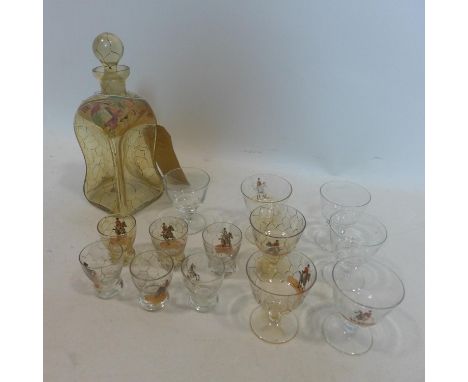 A 19th century glass decanter decorated with hand-painted hunting scenes with a collection of liqueur glasses, Decanter H: 24