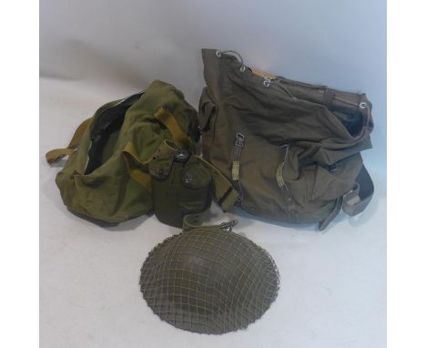 An Army canvas bag, with army helmet, water bottle and bag 