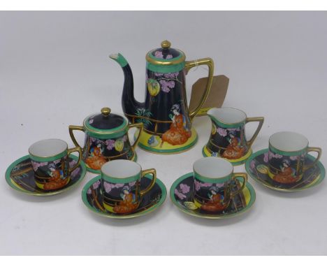 A Noritake porcelain coffee set comprising of coffee pot H: 17cm, sugar bowl H: 9cm, milk jug H: 7cm and 4 cups and saucers 