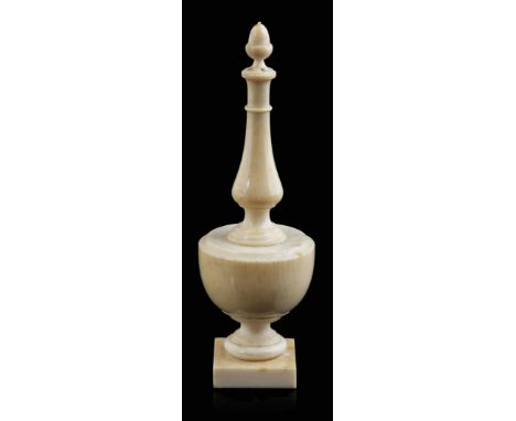 λ A turned ivory rosewater sprinkler, with an acorn finial and a baluster screw-off stem, with an urn base on a square plinth