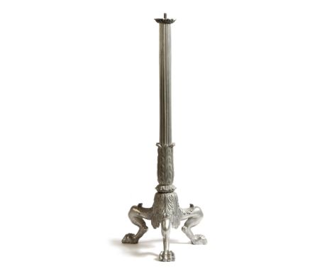 A white metal lamp base in Regency style, the ribbed stem above acanthus leaves and tripod monopodia paw feet, 71.2cm high.Cl