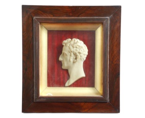 λ A 19th century wax relief portrait of a man, possibly Arthur Wellesley, the 1st Duke of Wellington, 19.5 x 10.5cm, with a g