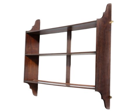 A 19th century mahogany hanging wall shelf, 72.5cm high, 84cm wide, 15cm deep.Click here to view the online page turning cata