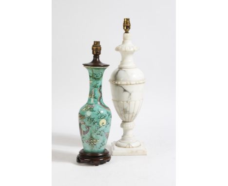 A Chinese porcelain famille verte table lamp, decorated with a scaly dragon, chasing a pearl amidst clouds, together with a m