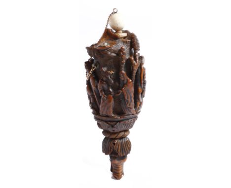 A 19th century coquilla nut flask, the body carved with religious scenes, including the Deposition of Christ, with a bugbear 