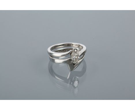 DIAMOND SOLITAIRE RING
the marquise cut diamond approximately 0.6 carats, in platinum, along with a matching wedding band, bo