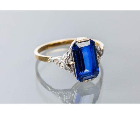 ART DECO STYLE SAPPHIRE AND DIAMOND RING
the central emerald cut sapphire of approximately 3.58 carats, on bifurcated diamond