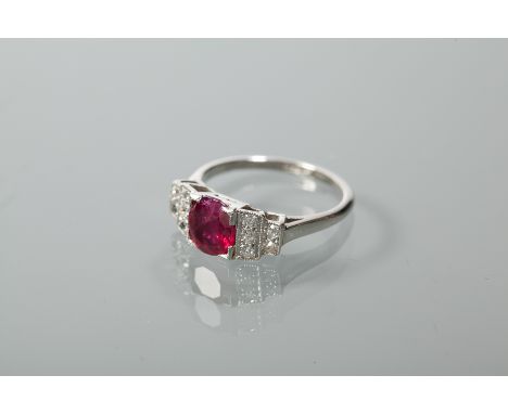 ART DECO STYLE RUBY AND DIAMOND RING
the oval ruby of approximately 1.66 carats, flanked by rows of brilliant cut diamonds, i