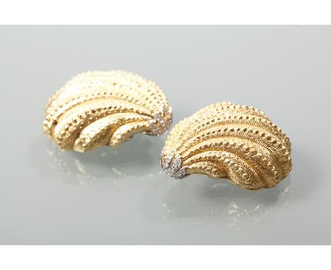 PAIR OF DIAMOND SET EIGHTEEN CARAT GOLD SHELL MOTIF CARTIER CLIP EARRINGS
each set with a cluster of brilliant cut diamonds, 