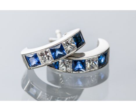 PAIR OF ART DECO STYLE SAPPHIRE AND DIAMOND EARRINGS
set with alternating princess cut sapphires and diamonds, each with diam