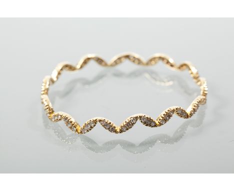 DIAMOND SET BANGLE
set with brilliant cut diamonds totalling approximately 4 carats, unmarked, 17.7gms gross