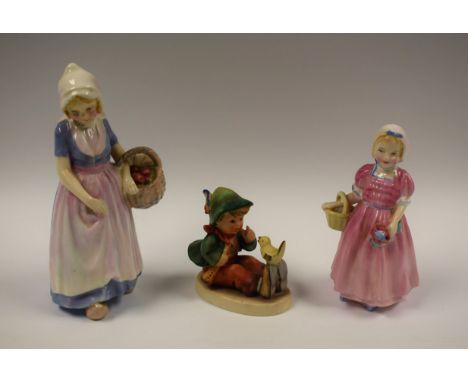 A Royal Doulton figure, Annette, HN1471; another, Tinkle Bell, HN1677; a Goebel figure, boy and bird (3)