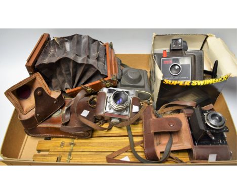 Photographic Equipment - a late 19th Century wooden folding camera, E&T Underwood, Birmingham; others, Braun Paxette with Car