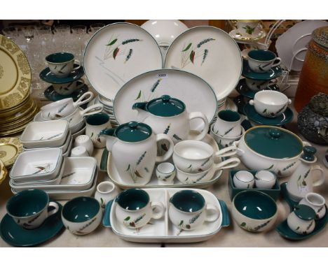 A Denby Greenwheat pattern part dinner and coffee/tea service, serving dishes, large quantity