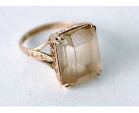 CITRINE SET RING, cushion cut citrine with pierced gallery and plain 9ct gold band, size K ½, Birmingham 1989, 5.6g