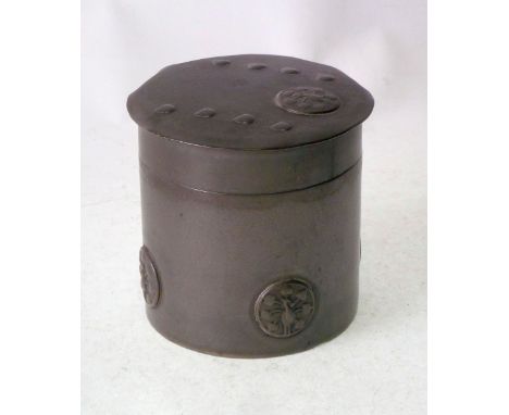 TUDRIC PEWTER CYLINDRICAL CADDY AND COVER, with stylised peacock motif, 0103, 4" (10cm) high