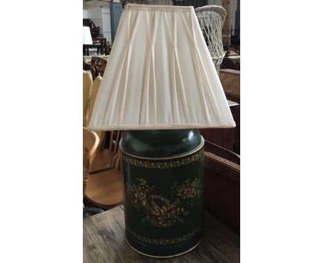 An enamel tin lamp with shade 