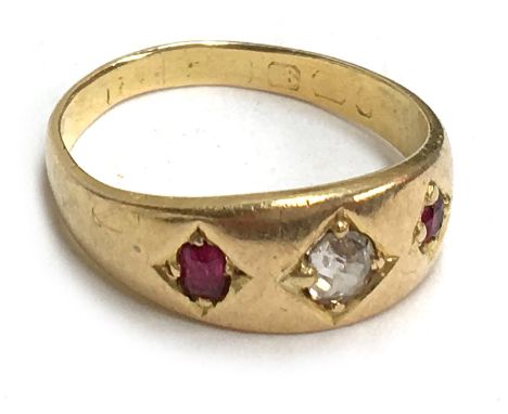 18ct gold dress ring set with one diamond flanked by a ruby each side, size N, approx. gross weight 4g 