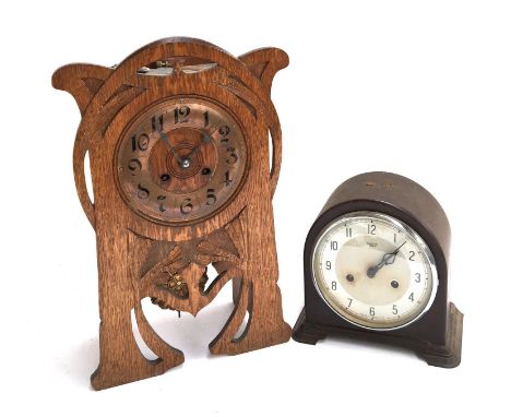 An oak cased Art Nouveau mantle clock, with key, 42cmH; together with a Smiths Enfield mantle clock