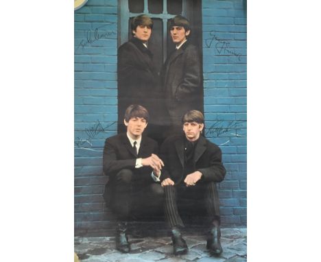 A photographic print of a signed poster of the Beatles, 76x51cm 