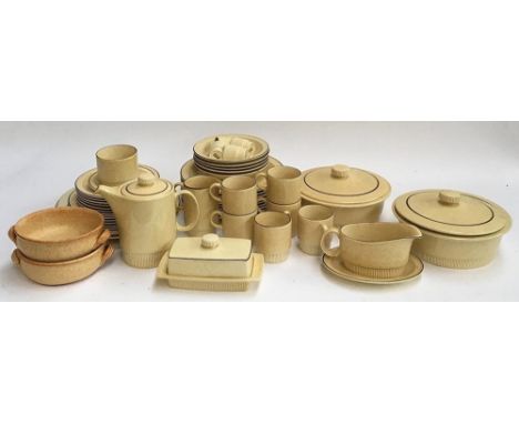A Poole Pottery dinner service, to include dinner plates, side plates, cups and saucers, two tureens, etc 
