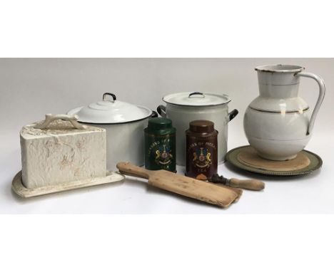 A mixed lot of vintage kitchenalia, to include several enamel bread bins, enamel jug, butter pats, bread board, cheese cloche