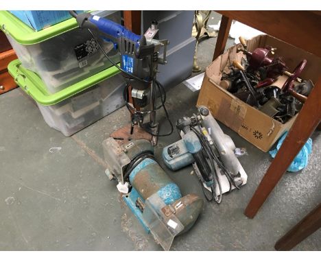 An Erbauer 190mm circular saw; together with an angle grinder and a drill stand with Energer percussion drill 